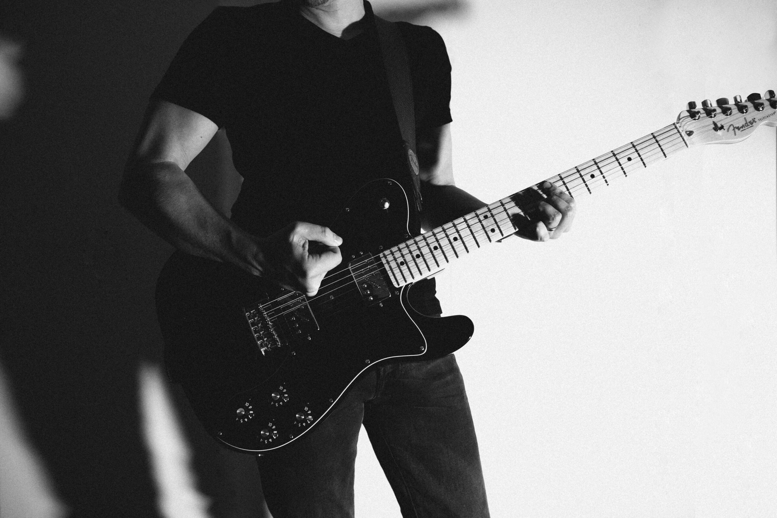 strumming on guitar